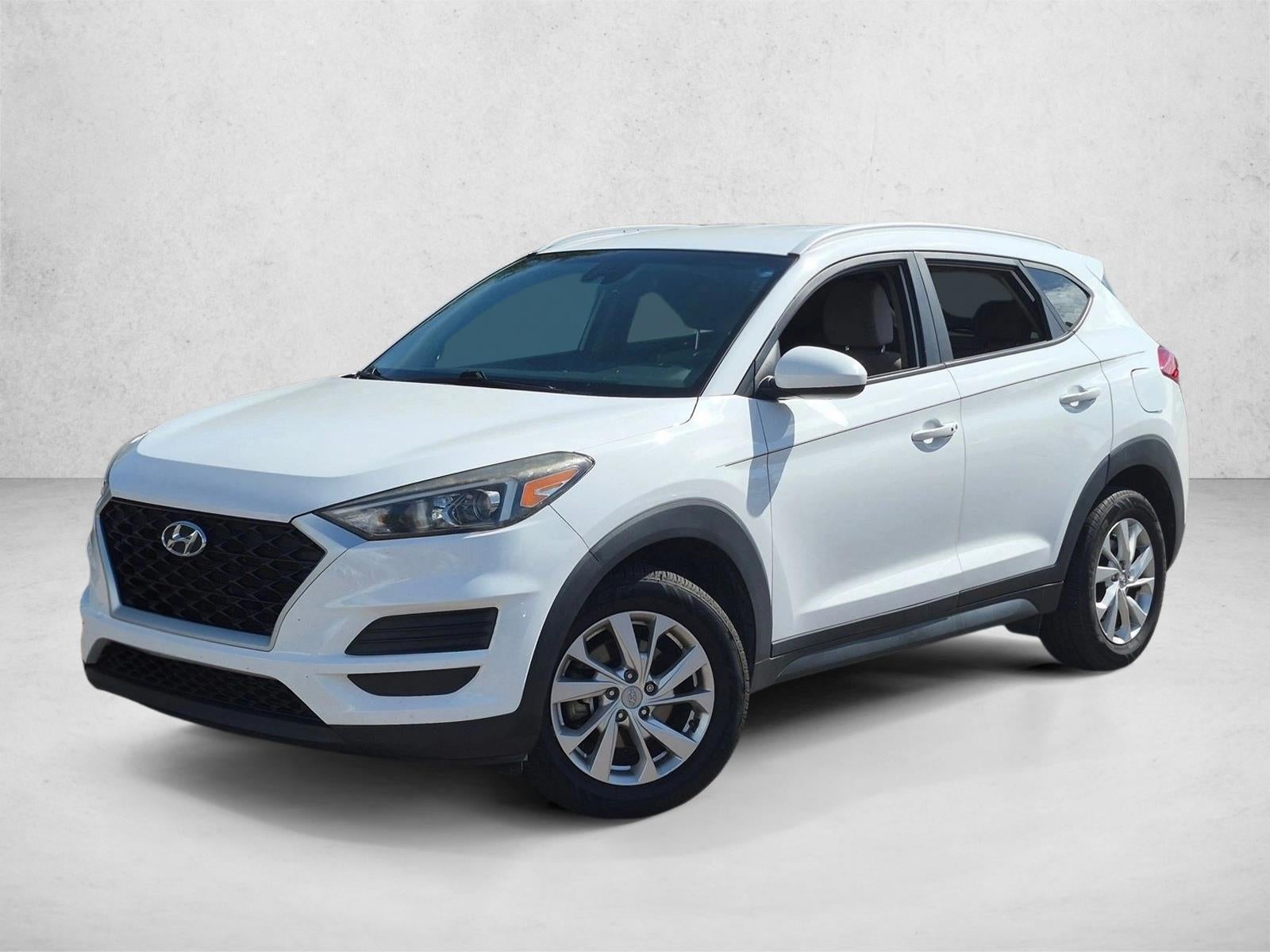 2020 Hyundai TUCSON Value FWD in Winter White — front three-quarter view